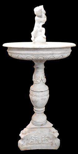 FOUR PIECE OUTDOOR CARVED MARBLE