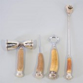 FOUR-PIECE STERLING SILVER AND