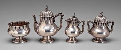 Four-piece sterling tea service: