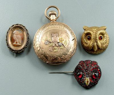 Four pieces gold owl jewelry: three