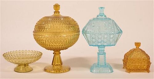 FOUR PIECES OF COLORED GLASS.Four