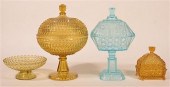 FOUR PIECES OF COLORED GLASS.F