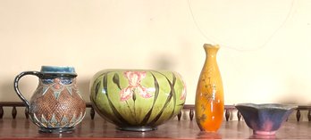 Four pieces of vintage art pottery,