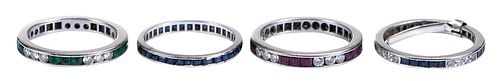 FOUR PLATINUM STACKABLE RINGS, BLUE