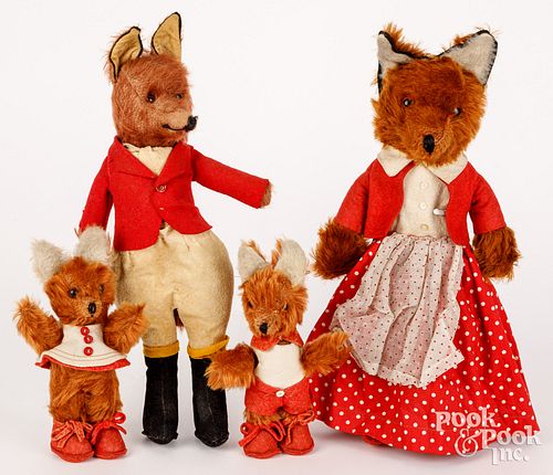 FOUR PLUSH DRESSED FOXESFour