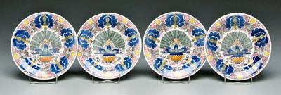 Four polychromed Delft plates: