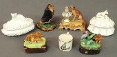 Four porcelain covered boxes w