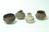 FOUR PREHISTORIC POTTERY VESSE
