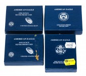 FOUR PROOF SILVER EAGLES IN MI
