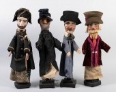 FOUR PUPPETS WITH CARVED WOOD