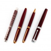 FOUR RED EUROPEAN PENS A Caran
