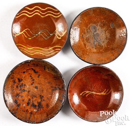 FOUR REDWARE PLATES, 19TH C.Four