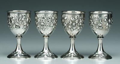Four Repoussé sterling goblets: