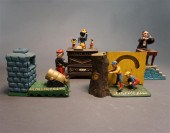 FOUR REPRODUCTION CAST IRON ME
