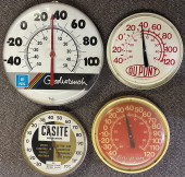 FOUR ROUND GARAGE THERMOMETERS