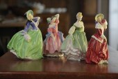 FOUR ROYAL DOULTON FIGURES.  E