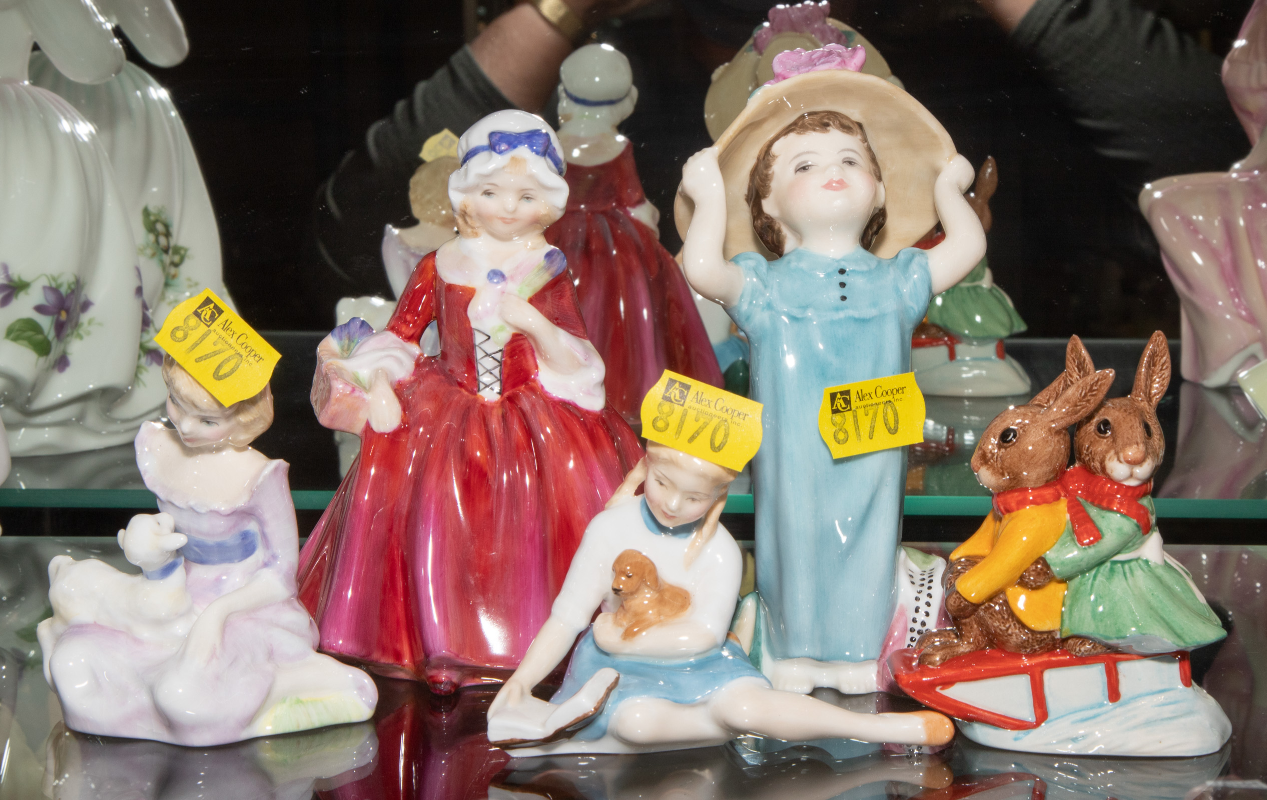 FOUR ROYAL DOULTON FIGURES Includes