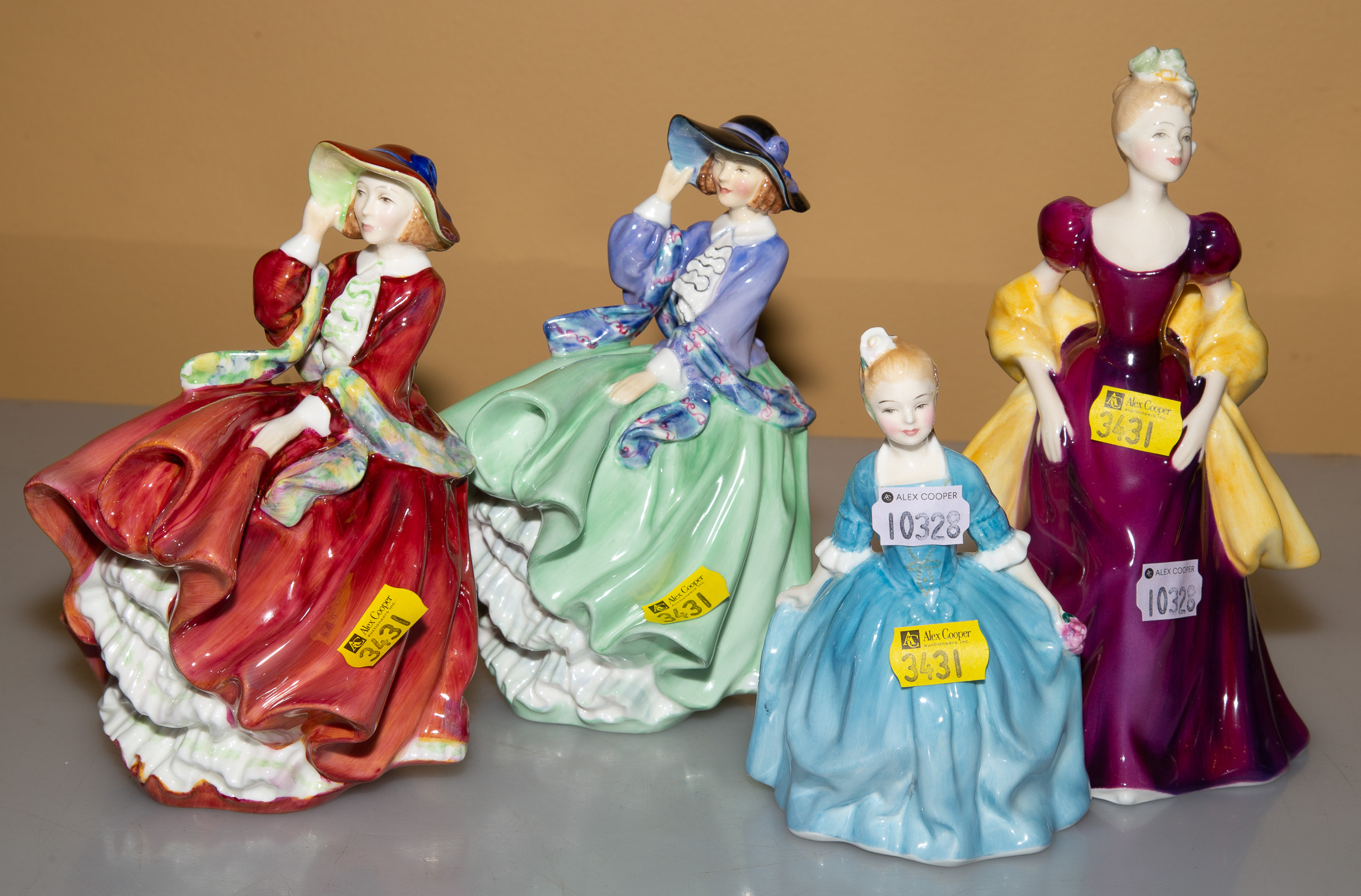 FOUR ROYAL DOULTON FIGURES