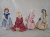 Four Royal Doulton figurines i