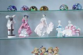 FOUR ROYAL DOULTON FIGURINES.