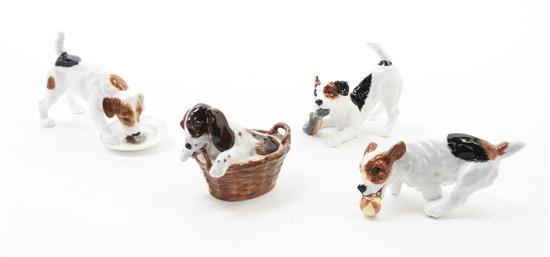 Four Royal Doulton Porcelain Dogs