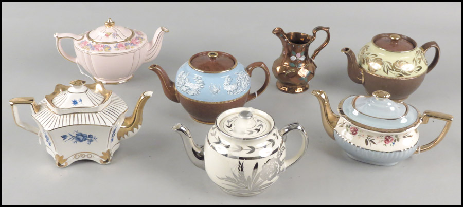FOUR SADLER LUSTERWARE TEAPOTS.