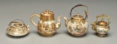 Four Satsuma teapots: one with