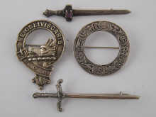 Four Scottish brooches three