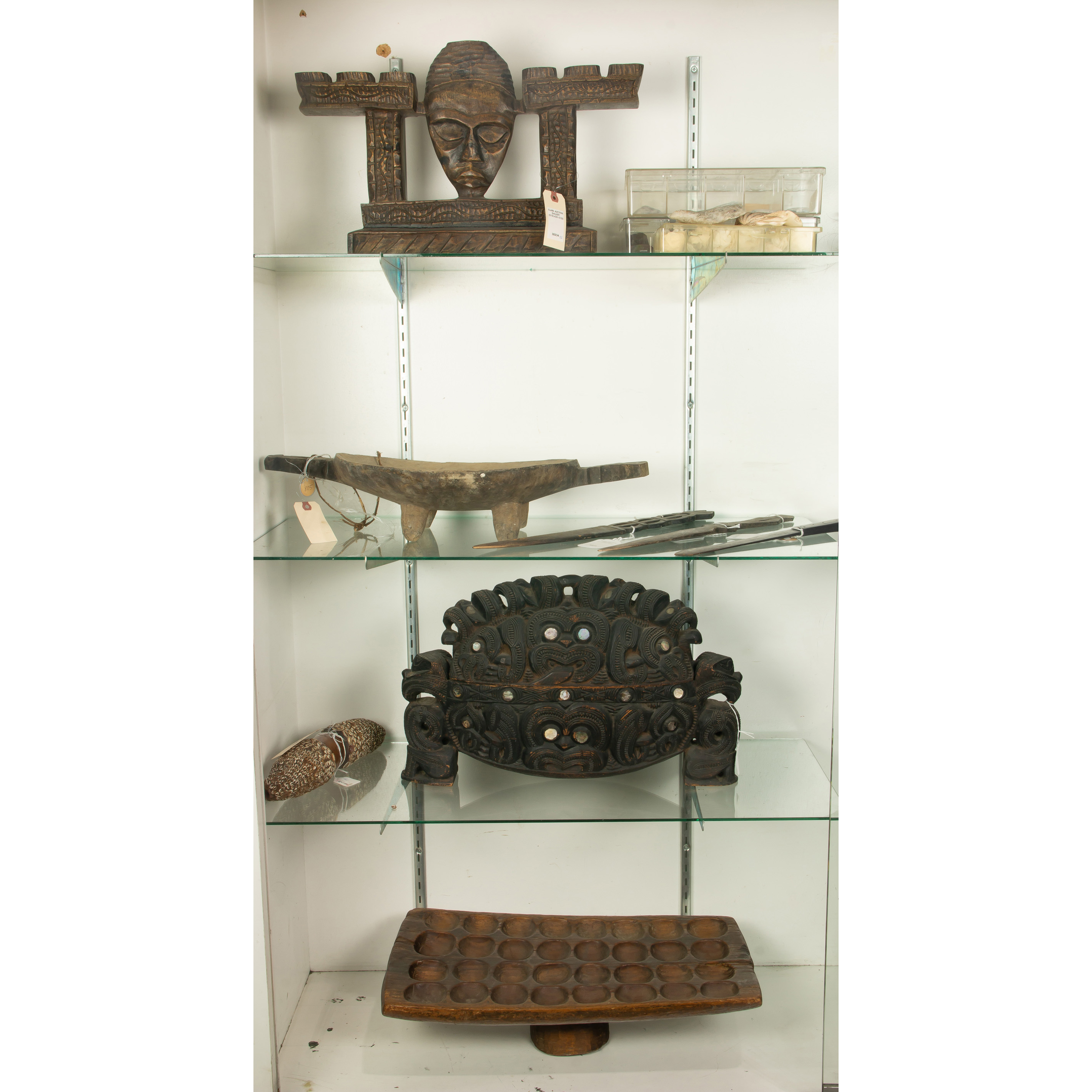 FOUR SHELVES OF ASSOCIATED