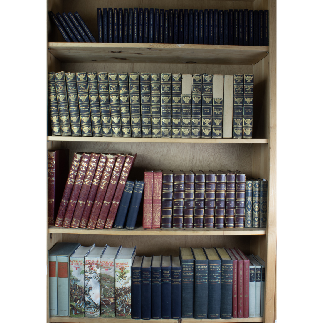 FOUR SHELVES OF BOOKS, INCLUDING 7V