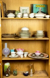 FOUR SHELVES OF DECORATIVE ART