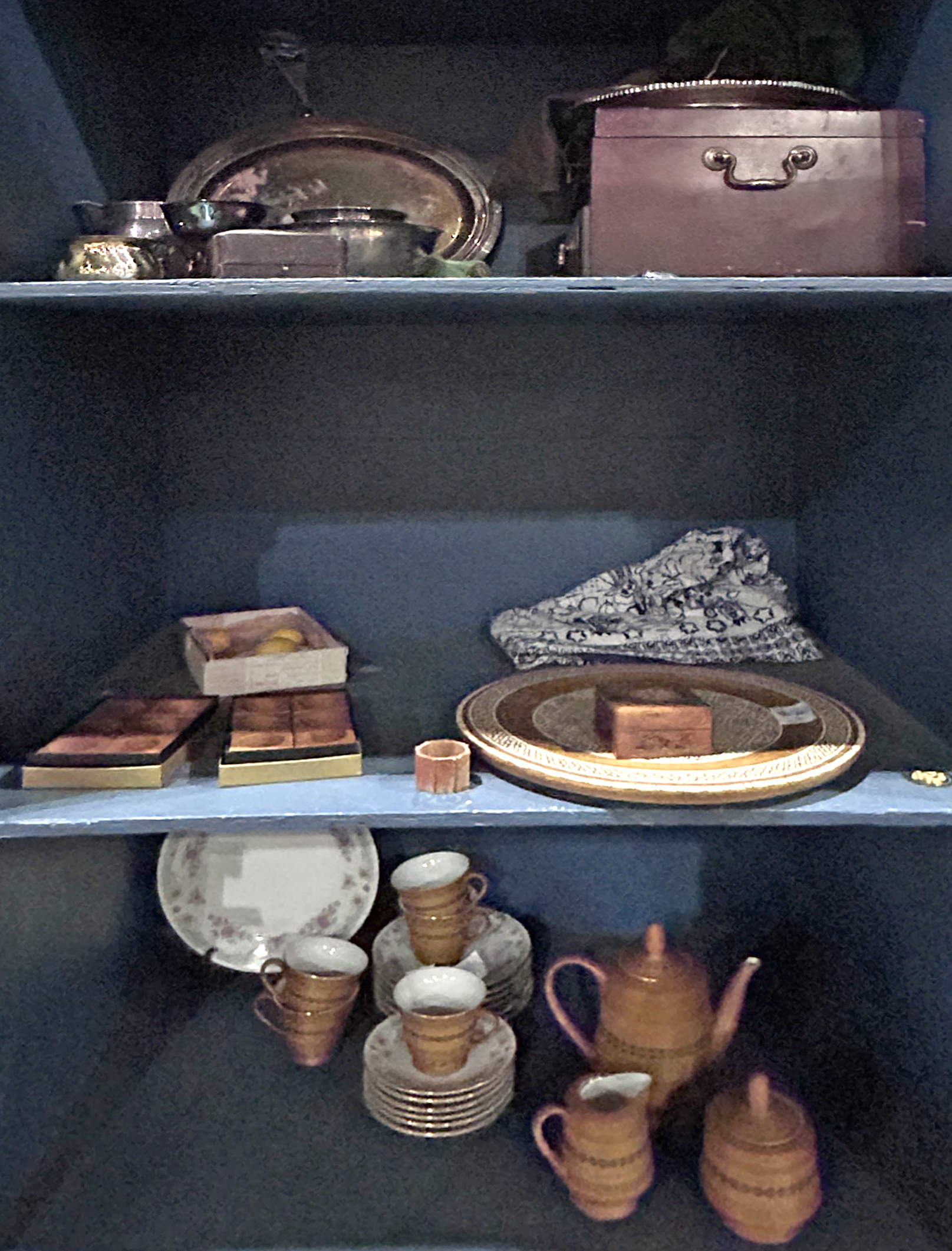FOUR SHELVES OF DECORATIVES Four