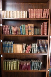 FOUR SHELVES OF VINTAGE LEATHE