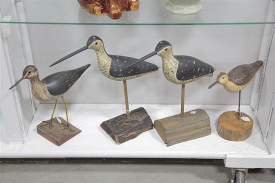FOUR SIGNED SHOREBIRD DECOYS.