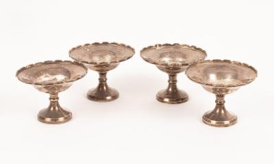 Four silver bonbon dishes,