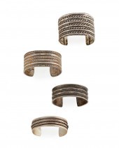 FOUR SILVER CUFF BRACELETSFour