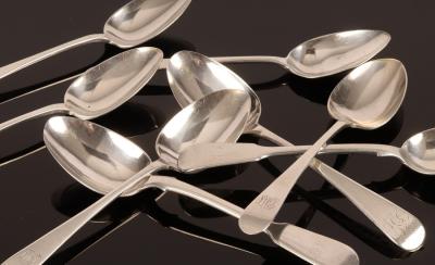 Four silver dessert spoons,