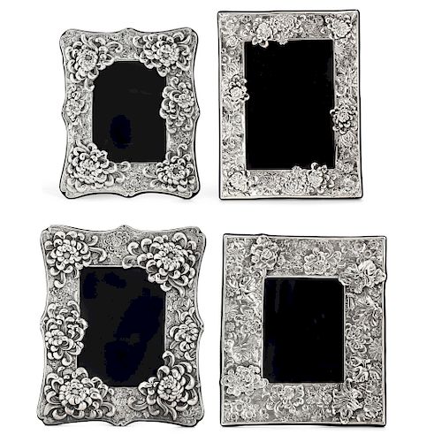 FOUR SILVER FLORAL DECORATED