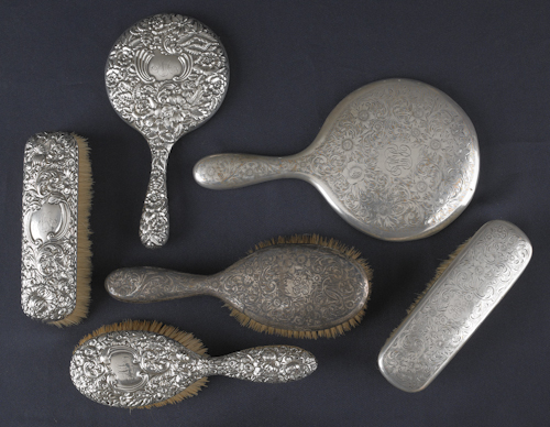 Four silver mounted brushes