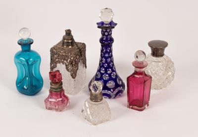 Four silver mounted glass scent