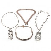 FOUR SILVER NECKLACES To inclu