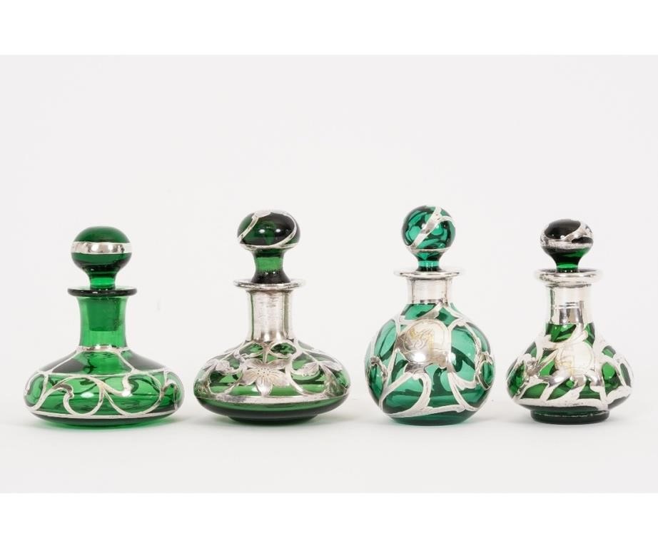 Four silver overlay green glass