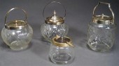 FOUR SILVER PLATE MOUNTED CRYS