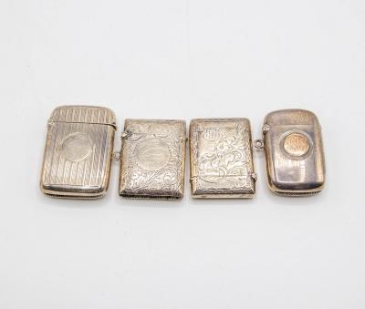 Four silver vesta cases including