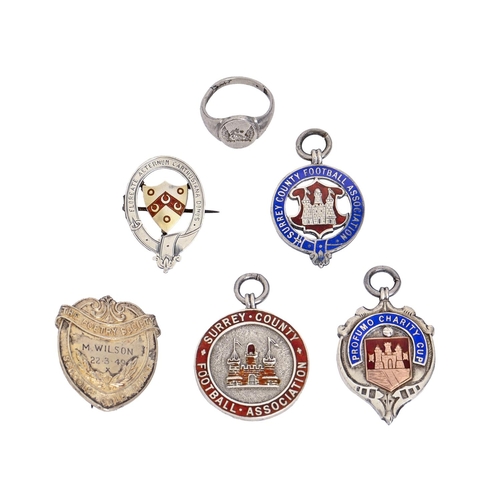 Four silver watch fob shields,