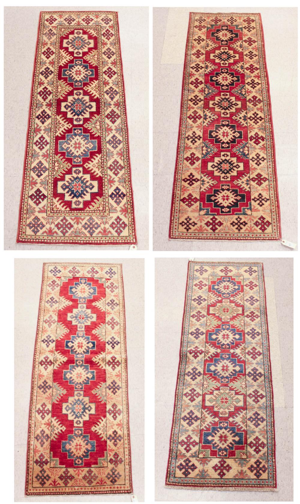 FOUR SIMILAR HAND KNOTTED