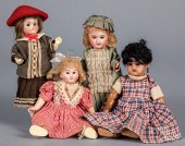 FOUR SMALL BISQUE HEAD DOLLSFo