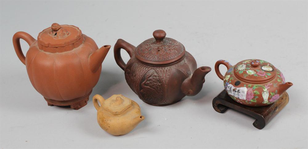 FOUR SMALL CHINESE YIXING TEAPOTS