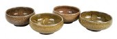 FOUR SMALL MARK HEWITT BOWLS(P