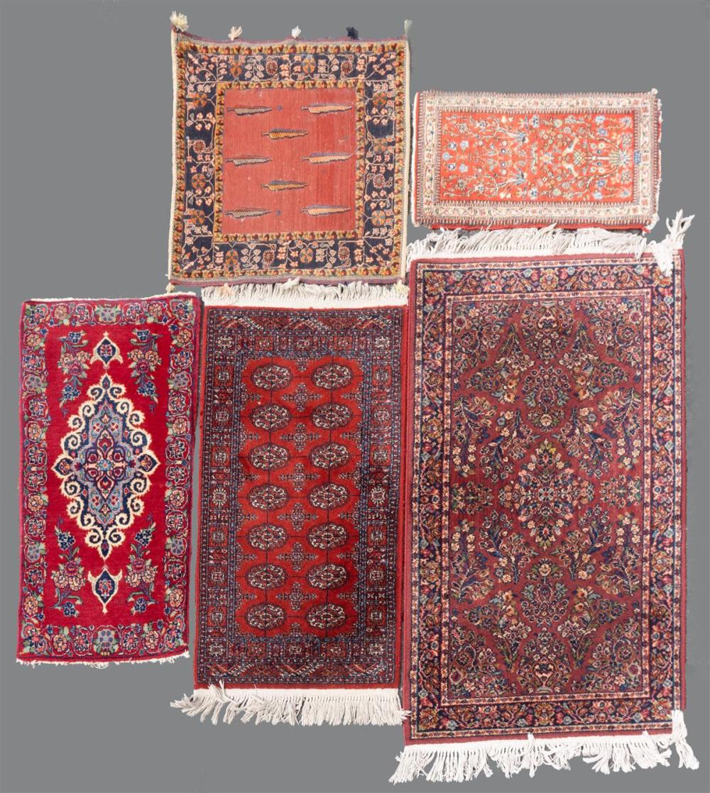 FOUR SMALL ORIENTAL RUGS